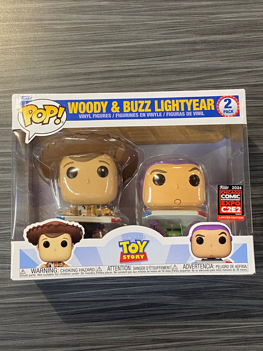 Funko POP! Disney: Toy Story - Woody & Buzz Lightyear (2024 Chicago Comic Expo [C2E2]) [2-Pack](Damaged Box)