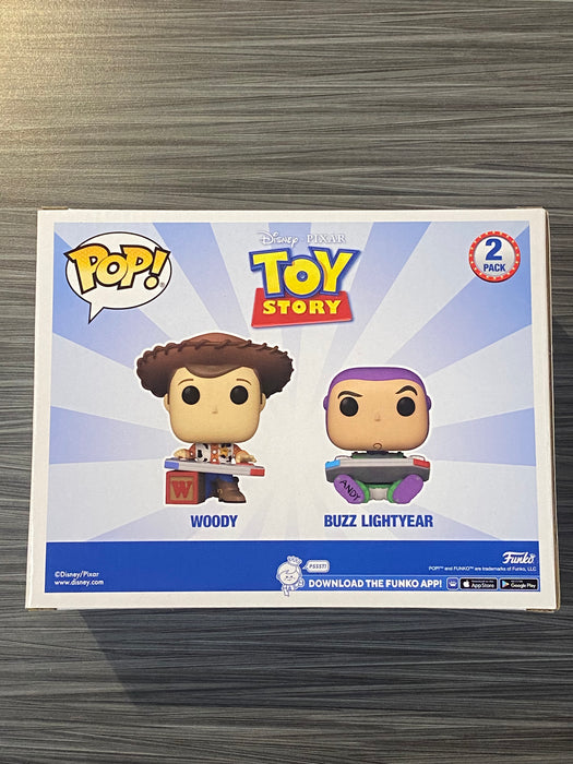 Funko POP! Disney: Toy Story - Woody & Buzz Lightyear (2024 Chicago Comic Expo [C2E2]) [2-Pack](Damaged Box)