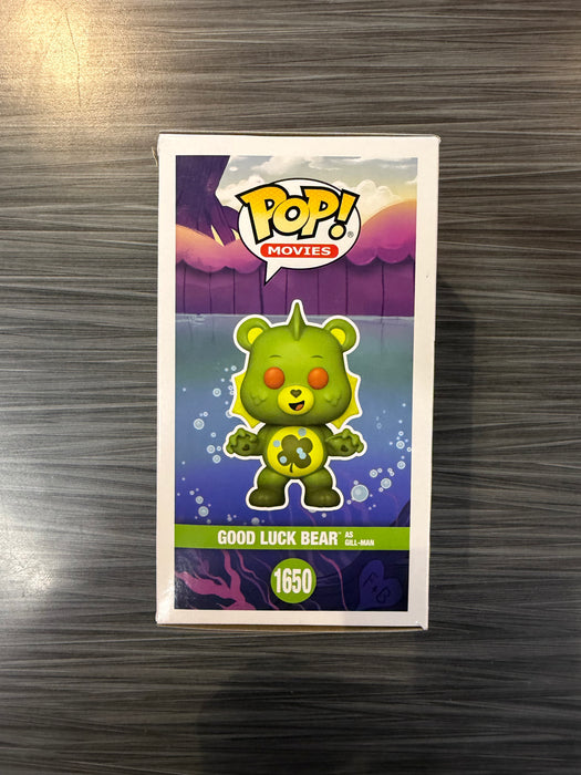 Funko POP! Movies: Care Bears x Monsters - Good Luck Bear As Gill-man (Funko 5000 Pcs)(Damaged Box*) #1650